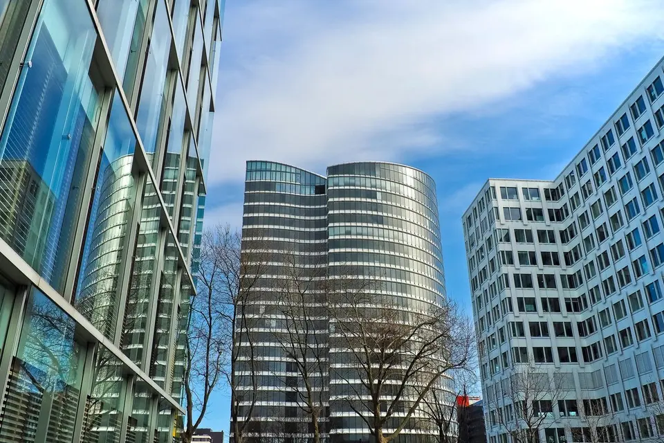 Modern office towers against a blue sky