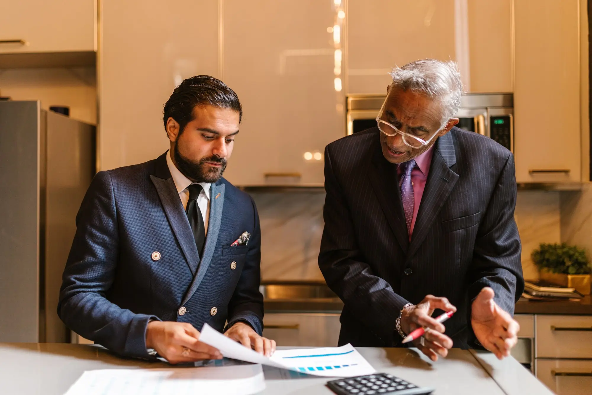 Advisors reviewing a client's financial documents